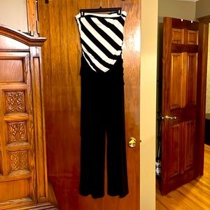 Women’s Strapless Jumpsuit. Solid black bottom, black & white top. Sash